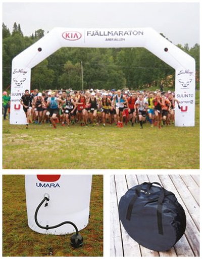 Надувная арка на старте забега Fjällmaraton; внизу шланг для накачки у основания арки и круглая сумка для перевозки